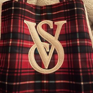 Victoria’s Secret tote bag.